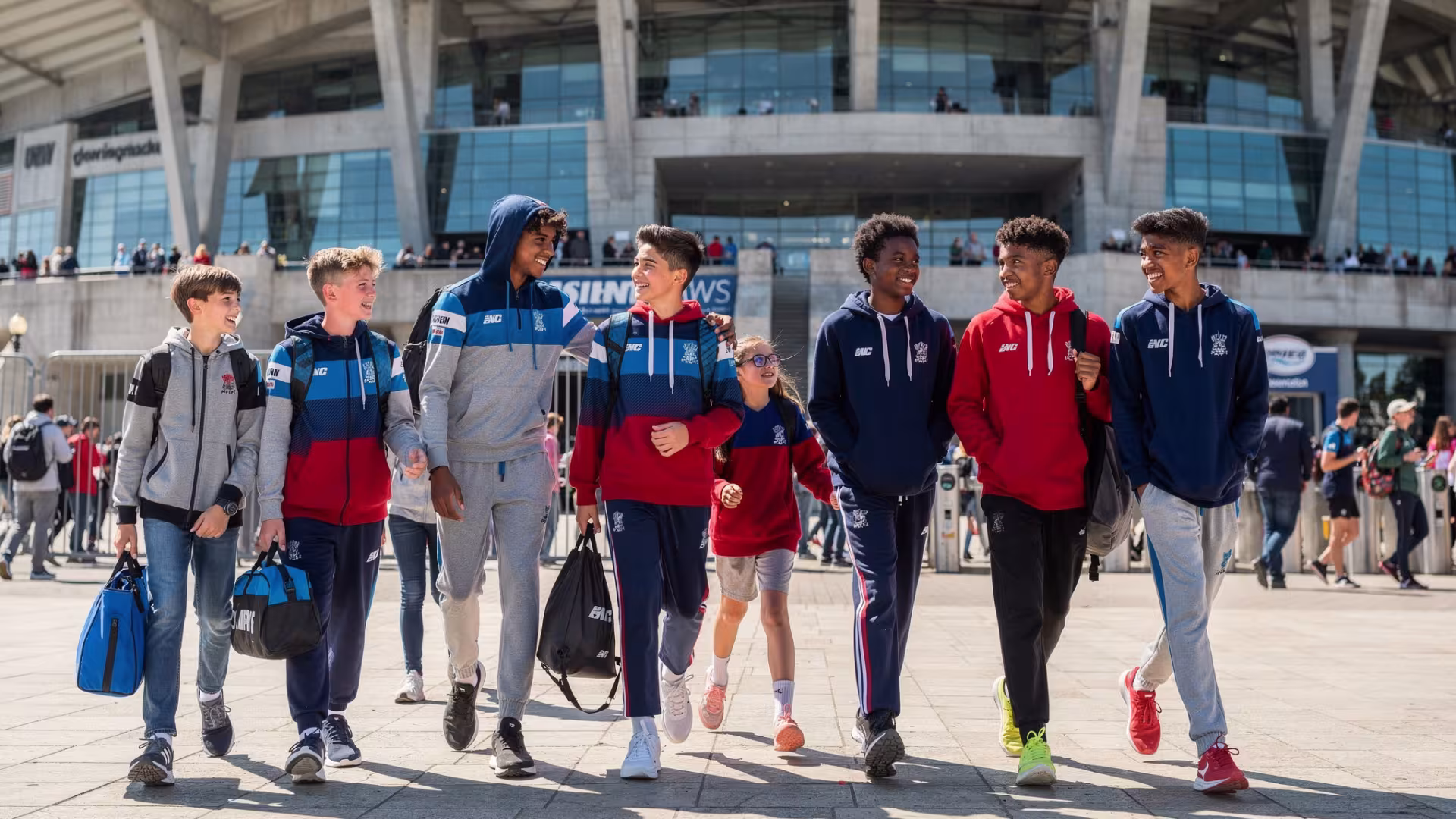 Kids outside a rugby stadium