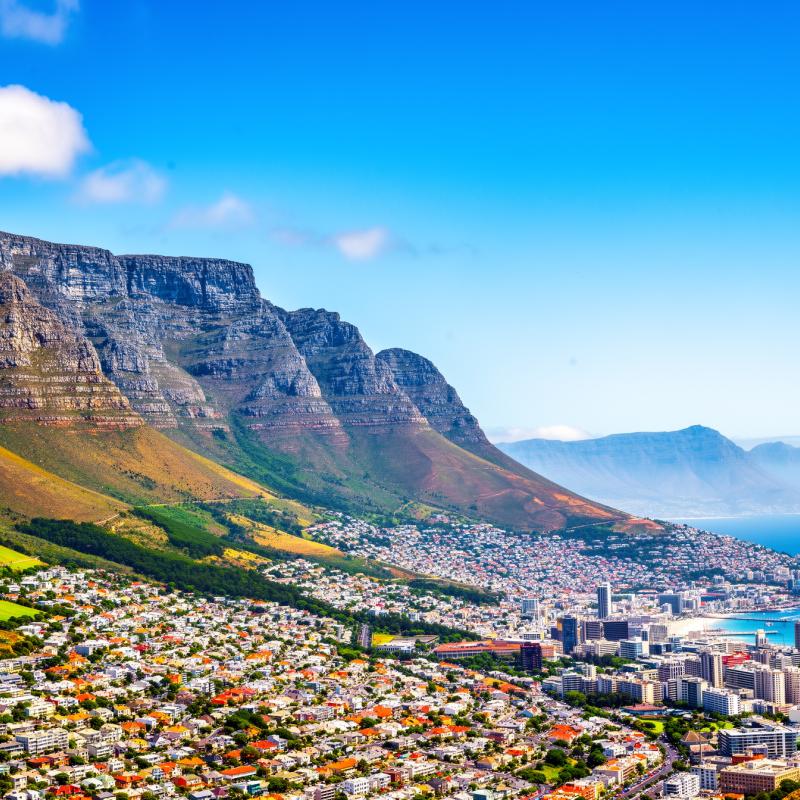 Table Mountain overlooking Cape Town, South Africa, under bright blue sky
